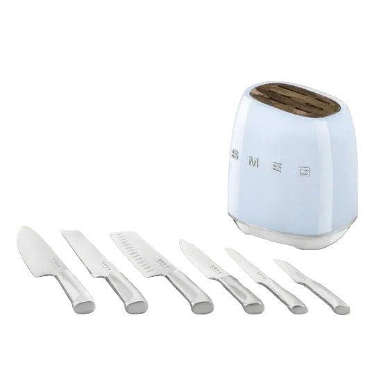 Set of knives on a kitchen counter with a Smeg toaster in the background