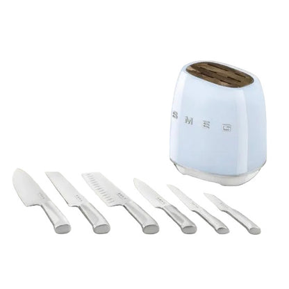 Set of knives on a kitchen counter with a Smeg toaster in the background