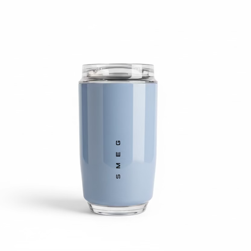 Blue tumbler with 'Smeg' branding on a kitchen counter
