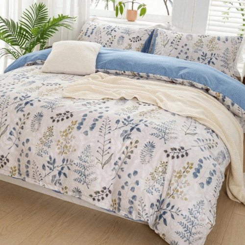 King size 6 piece bedding set, featuring a beautiful blue leaf design.
