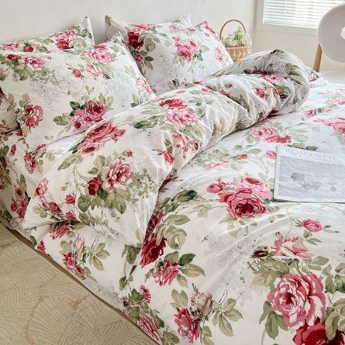 King size 6-piece  duvet cover set rose print with green leaves.