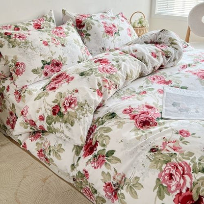 King size 6-piece  duvet cover set rose print with green leaves.