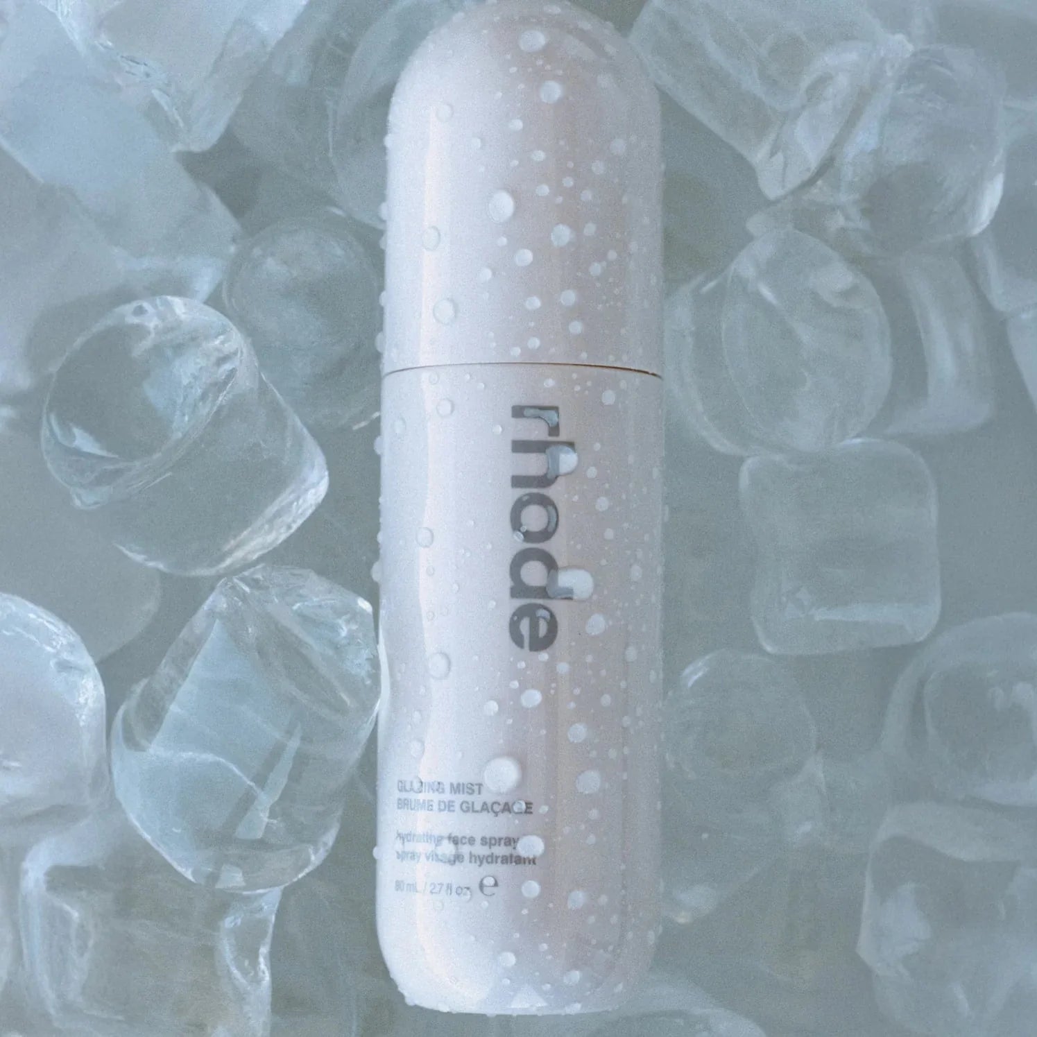 RHODE bottle with ice cubes in the background