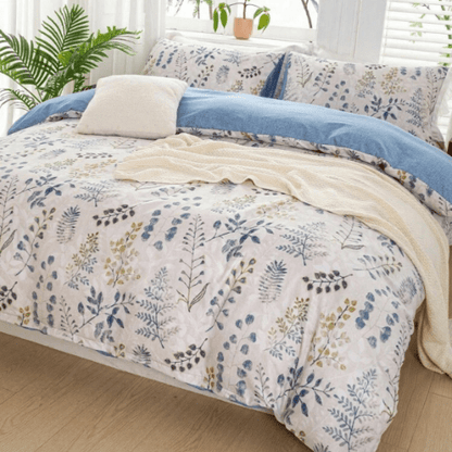 Queen size 6 piece bedding set, featuring a beautiful blue leaf design.