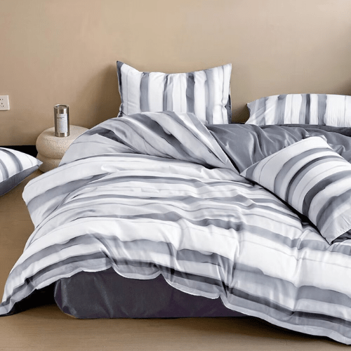 Single size, 4-piece, reversible duvet cover set featuring a striped design in a vibrant gray color.